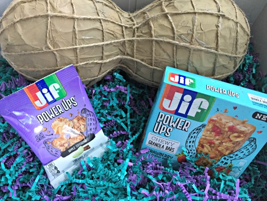 JIF Power Ups in a box with a paper mache peanut.