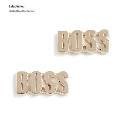 Shown: Gold earring that spell out the word BOSS. 