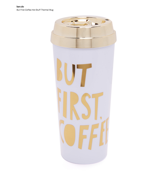 Shown: White thermal mug with gold top. Words on mug: But First, Coffee. 