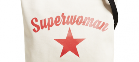 Shown:Large White Cotton Tote bag with the word “Superwoman” written above a lone red star.